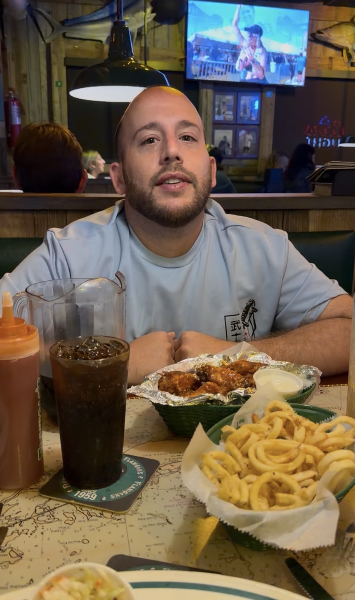 Winner enjoying another monthly Flanigan's prize installment