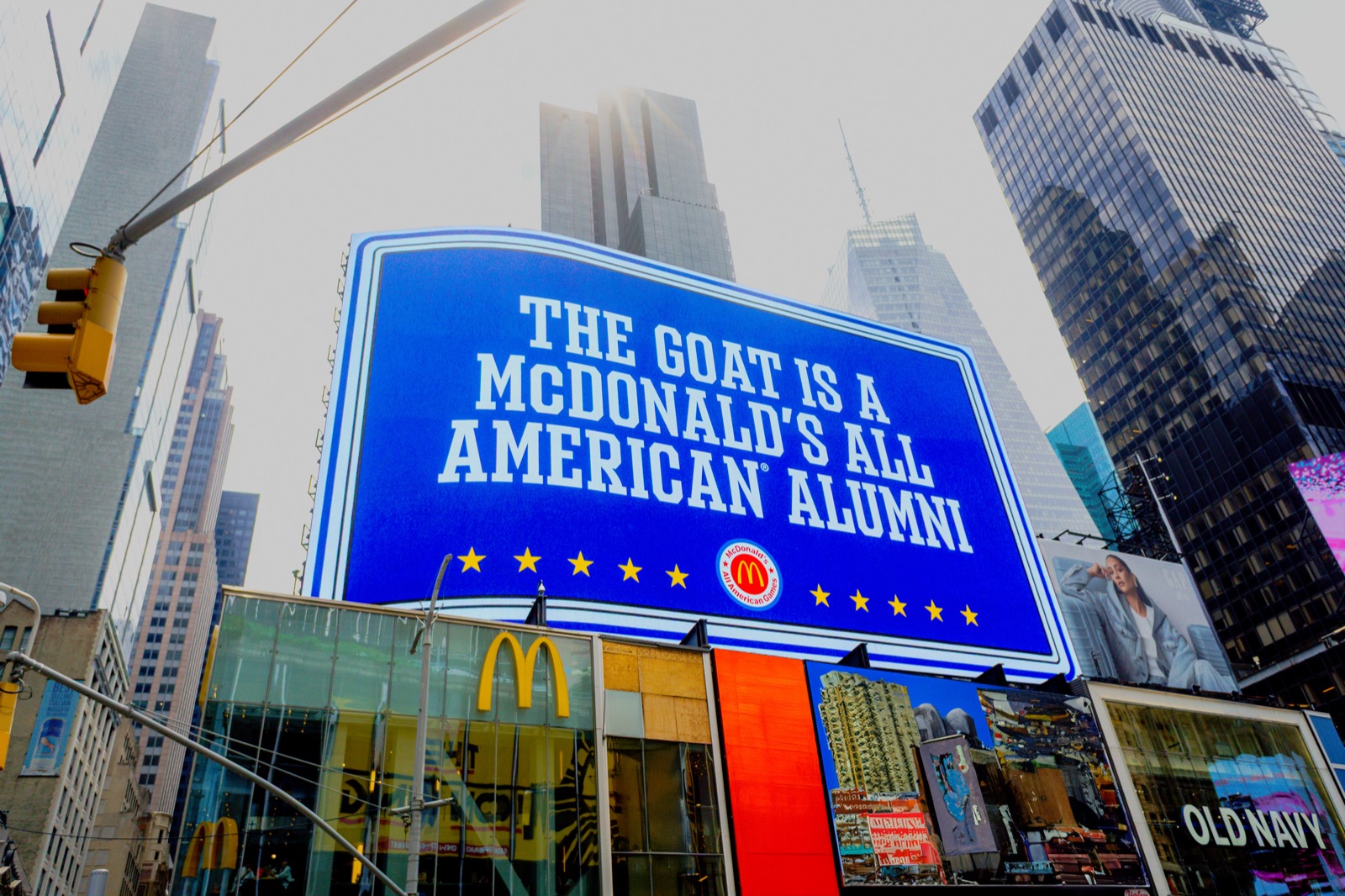 McDonald's Alumni Game billboard in Times Square